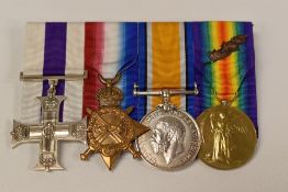 FIRST WORLD WAR MILITARY CROSS FOUR MEDAL GROUP with oak leaf (later ribbons) to Capt T R