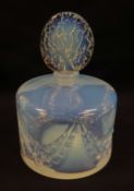 A SABINO OPALESCENT GLASS SCENT BOTTLE of circular form with oval naturalistic stopper and with