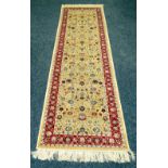 GOLD GROUND WITH RED BORDER CASHMERE RUNNER, 238 x 67.5 cms