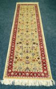 GOLD GROUND WITH RED BORDER CASHMERE RUNNER, 238 x 67.5 cms