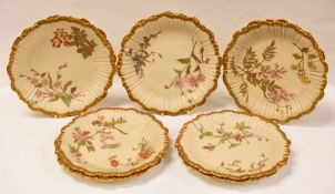 SET OF TEN ROYAL WORCESTER BLUSH-IVORY PLATES of fluted-form and decorated with gilding and a floral
