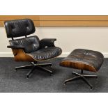 A MID TO LATE TWENTIETH CENTURY CHARLES AND RAY EAMES BUTTONED BLACK LEATHER CHAIR matching ottoma