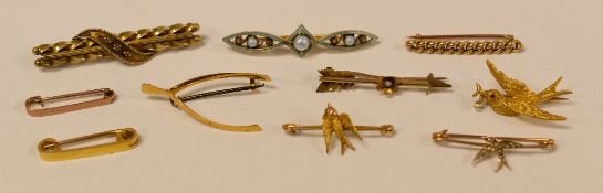 TEN PIN BROOCHES each in gold or yellow metal and comprising three marked 15ct, four 9ct and three