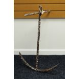 AN OLD IRON MARITIME ANCHOR of traditional form, 87cms high