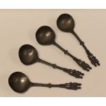 FOUR MATCHING DUTCH PEWTER MARRIAGE-SPOONS each with decorative handles with regal-couple