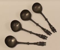 FOUR MATCHING DUTCH PEWTER MARRIAGE-SPOONS each with decorative handles with regal-couple