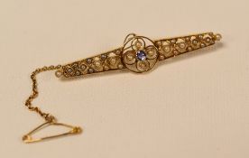 A 15ct YELLOW GOLD, SEED-PEARL & SAPPHIRE OPEN-WORK BAR-BROOCH of tapered and circular form, 4.2gms