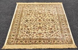 IVORY GROUND CASHMERE RUG in all over floral design, 169 x 116 cms