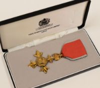 MODERN CASED OBE AWARDED TO MR DONALD MARSHALL WESTON by Toye, Kenning & Spencer, together with card