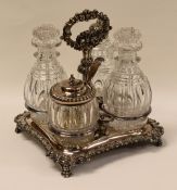 'OLD SHEFFIELD PLATE' FOUR-BOTTLE CRUET-ON-STAND raised on four corner claw-feet and with centre