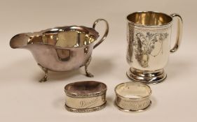 SILVER CHRISTENING MUG, SILVER SAUCE-BOATS & TWO SILVER NAPKIN RINGS, the mug of footed form,