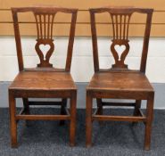 A PAIR OF ANTIQUE OAK SQUARE SEATED HALL CHAIRS with a lyre centre splat-back, 91 x 41 cms