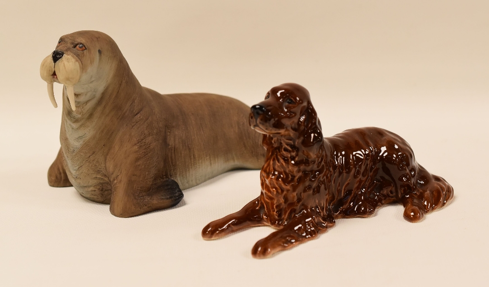 AN AYNSLEY PARIAN WALRUS BY JOHN AYNSLEY, 1975 & A BESWICK MODEL OF A RED SETTER, NO. 1060