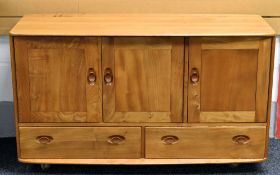 LIGHTWOOD ERCOL THREE DOOR SIDEBOARD with two drawers to base, 132 x 76 x 46 cms