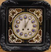 A FRENCH EIGHT-DAY EBONISED WALL CLOCK with brass and enamel decoration to the marble circular