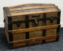 BANDED & DOMED CABIN-TRUNK, in teak and metal banding with metal lock and escutcheon, late