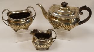 THREE PIECE SILVER TEA-SET each of fluted-form on four decorative claw-feet and comprising teapot