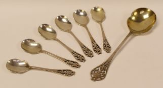 A SET OF 6 + 1 SILVER SORBET SPOONS each with pierced floral terminals, Sheffield 1939, 8.6ozs