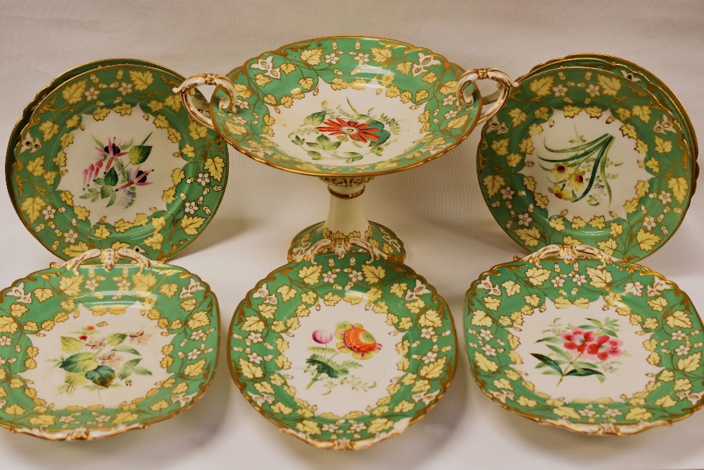 A STAFFORDSHIRE NINE PIECE PART - DESSERT SERVICE comprising comport, oval twin handled dish, pair