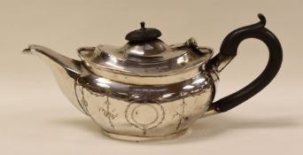 A SILVER TEAPOT of oval form with Bakelite handle and knop, Chester 1908, 8.8ozs