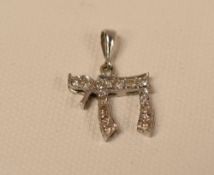 18ct WHITE GOLD PENDANT set with fifteen diamonds, 1.4gms