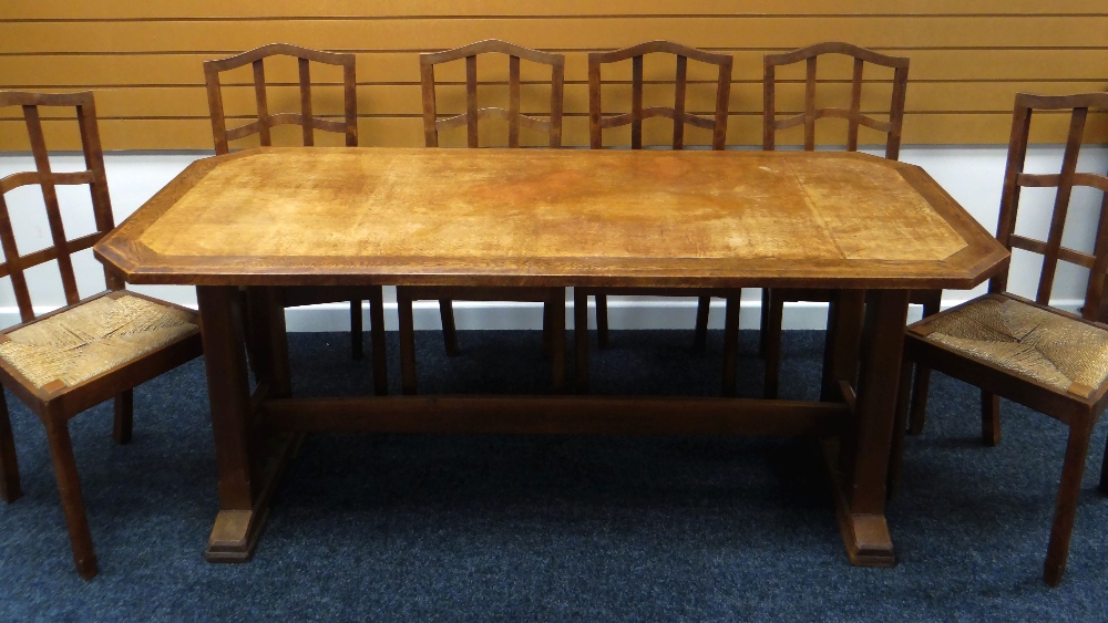 A BRYNMAWR OR STYLE DINING TABLE together with six rush-seated high-back dining chairs, 182 x 81 x