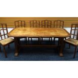 A BRYNMAWR OR STYLE DINING TABLE together with six rush-seated high-back dining chairs, 182 x 81 x