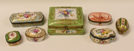 SEVEN CONTINENTAL PORCELAIN BOXES WITH HINGED LIDS, each mainly floral decorated with hinged lids