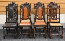 EIGHT EBONISED HIGH BACK CARVED CHAIRS, some with rush seats