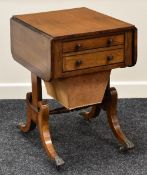 ROSEWOOD DROP LEAF SEWING TABLE with drawer and dummy drawer either side on brass castor feet, 30