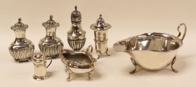 PARCEL OF SILVER TABLE-WARE comprising sauce-boat, three-piece condiment-set, a pepperette, salt and