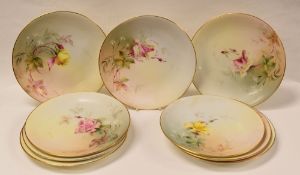 SET OF NINE ROYAL WORCESTER PLATES, of circular form with gilded borders and painted with wild