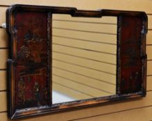 AN ORIENTAL OBLONG MIRROR with a panel to each side of the mirror decorated with a raised and