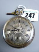 An open faced silver pocket watch with keywind movement and silvered dial set with black Roman