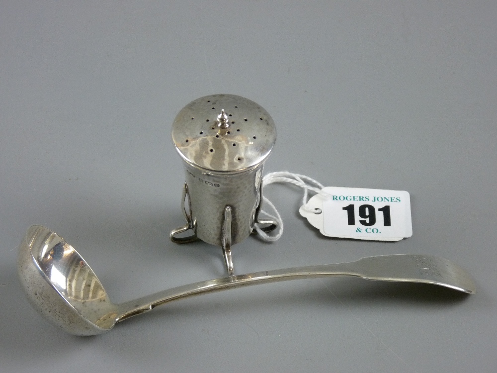 A fiddle pattern silver cream ladle, 1.6 troy ozs, Dublin 1825 and a beaten silver shaped pepper pot