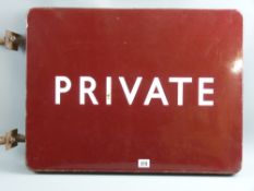 A British Rail burgundy enamel sign with the word 'Private' in white enamel to one side, 46 cms