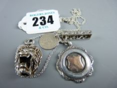 A fine link silver neck chain with a 925 silver mask pendant, a silver trophy pendant, a silver