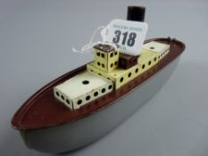 A clockwork tinplate boat with grey hull and black chimney, 19 cms long, unknown maker (rudder and