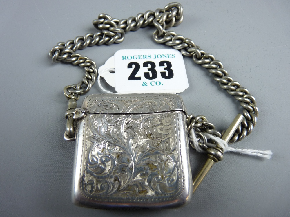 A bright cut silver vesta, Birmingham 1913 with a graduated link white metal Albert, T-bar and