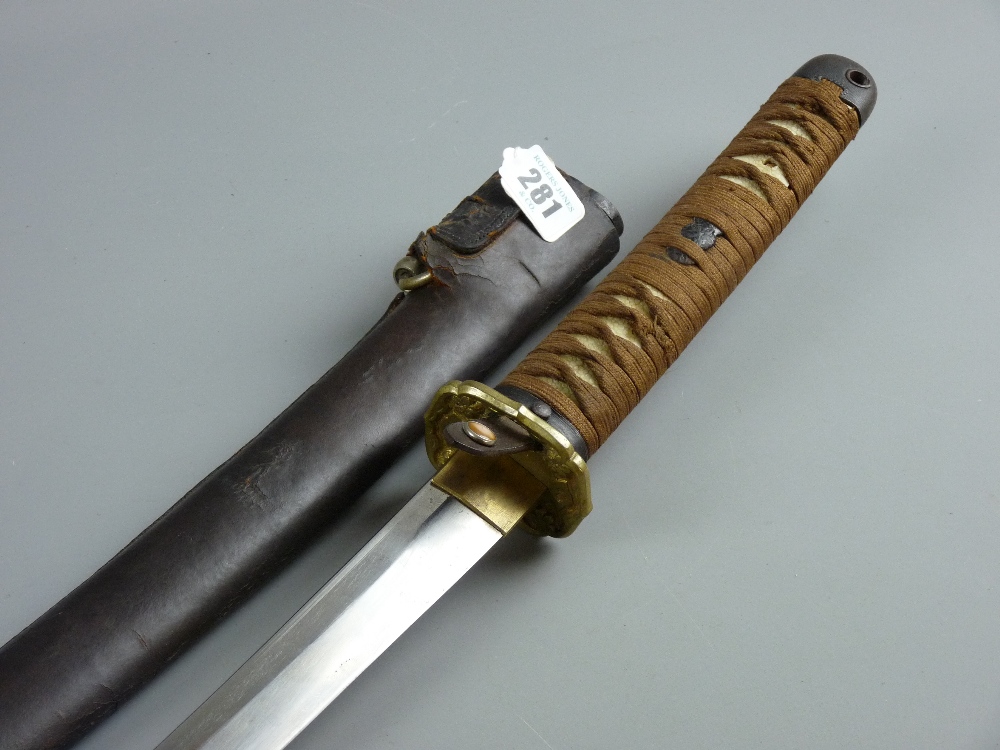 A Japanese World War II Army officer's sword katana in a black lacquered saya with leather combat