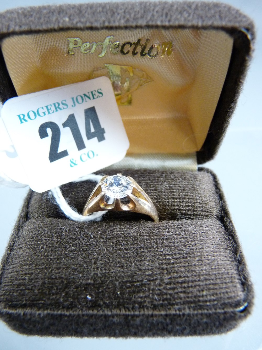 A nine carat gold signet ring with large cz solitaire, 2.3 grms gross