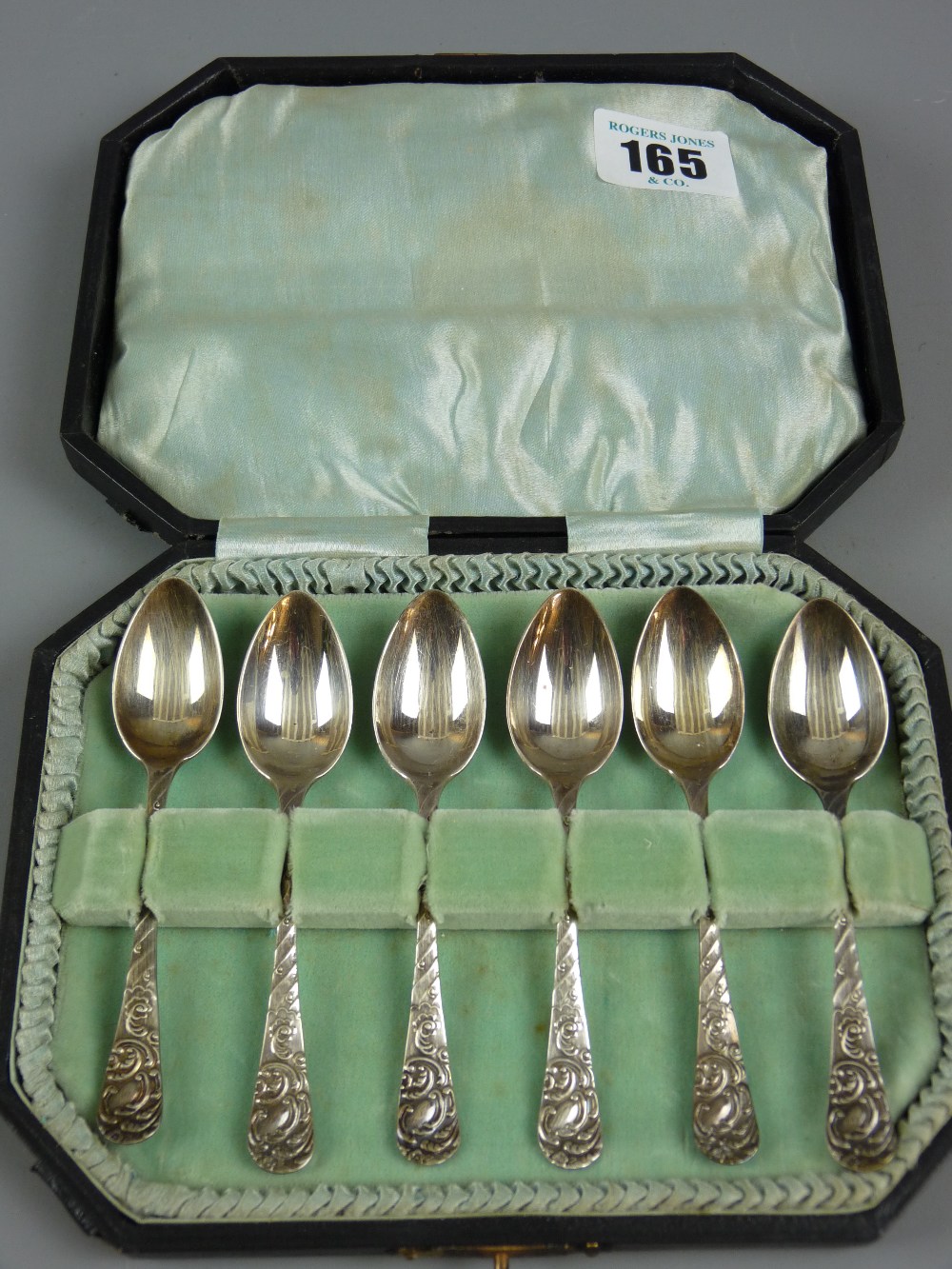A cased set of six hallmarked silver teaspoons, L & S maker, Birmingham 1910