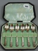 A cased set of six hallmarked silver teaspoons, L & S maker, Birmingham 1910