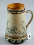 Doulton Lambeth - a rare sgraffito decorated stoneware water jug by Hannah B Barlow depicting