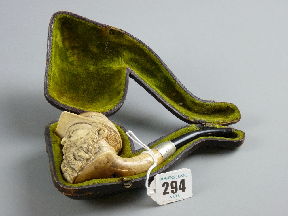 A 19th Century carved Meerschaum pipe in a fitted case depicting a bearded man wearing a Confederate
