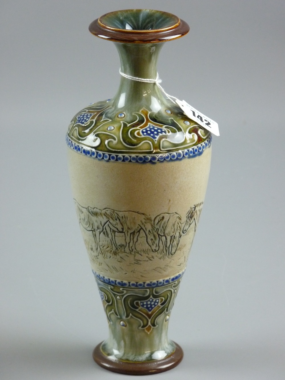 Hannah Barlow - a Royal Doulton stoneware, sgraffito decorated with a central band of ponies on a