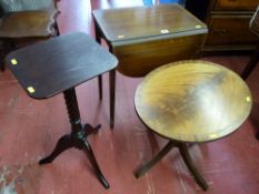 A reproduction mahogany twin flap side table, an oval topped walnut side table and a mahogany wine