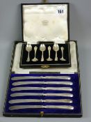 A cased set of hallmarked silver teaspoons, Birmingham 1949 and a cased set of silver handled butter