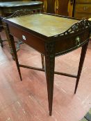 A rectangular top reproduction gallery top single drawer side table having carved tapering