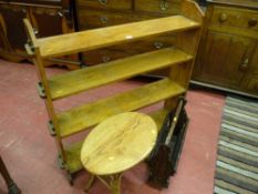 An oak four shelf open bookcase with peg joint ends, an oak top oval side table on a bamboo and